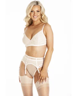 Blonde model wearing full Ivory Linger set